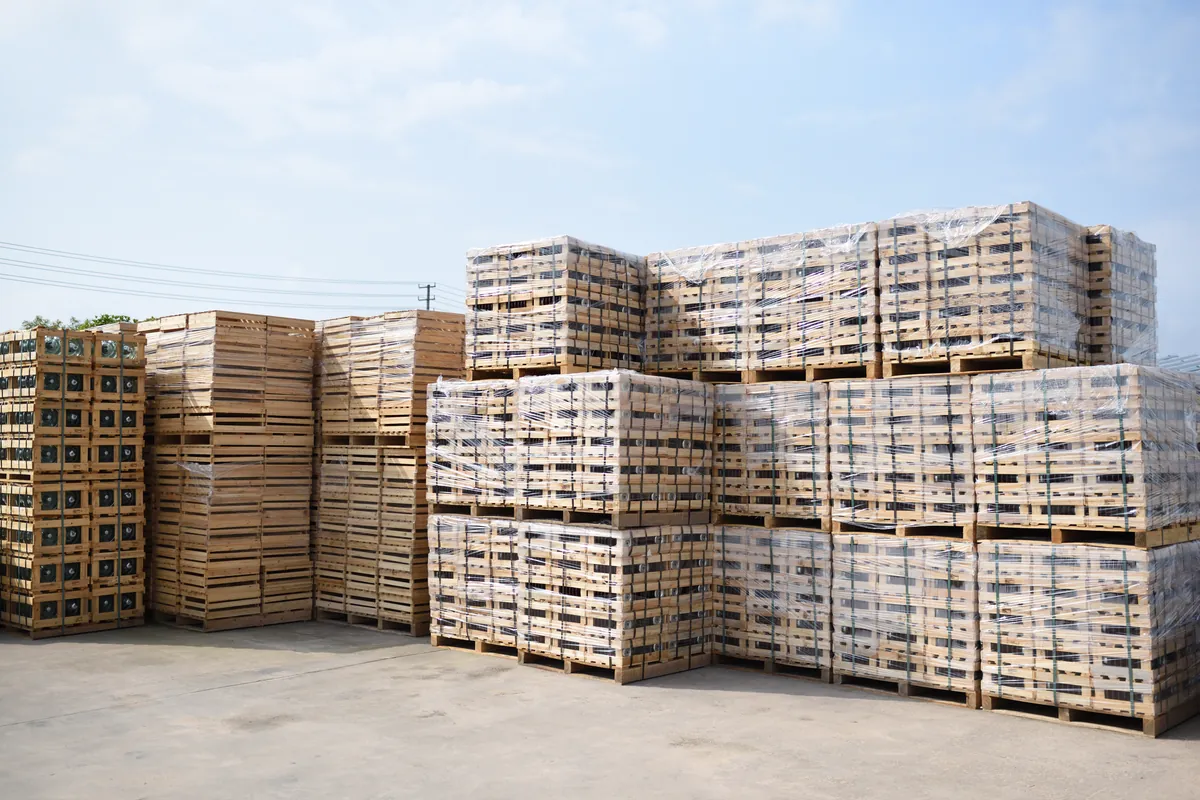 Crated insulator units packed and staged for dispatch