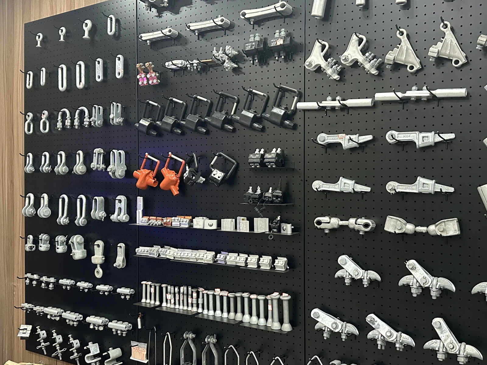 Electrical line fittings and connection components on the sample display wall inside SUNENG
