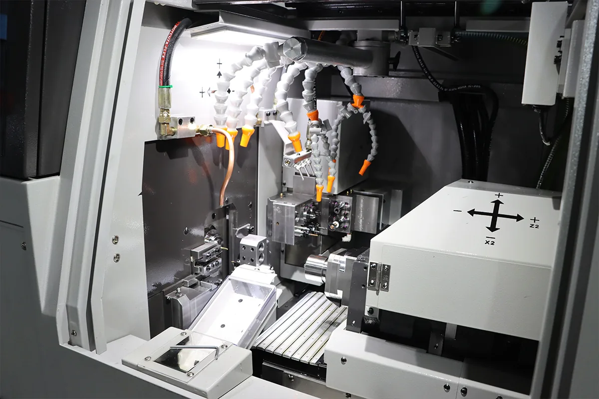 CNC machine interior with tooling and coolant nozzles