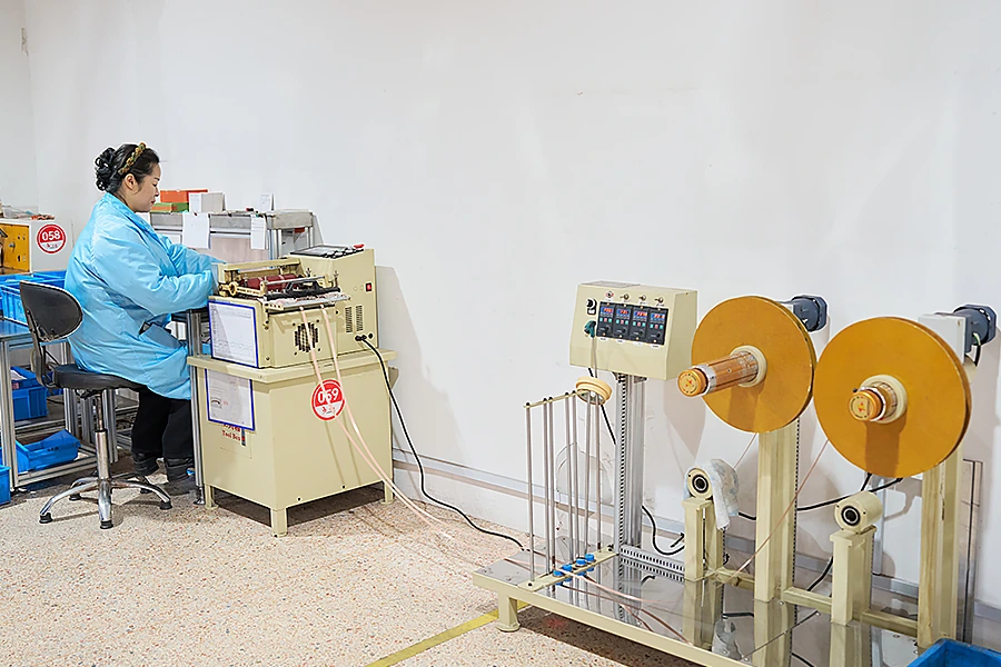 Operator at a strip-processing workstation