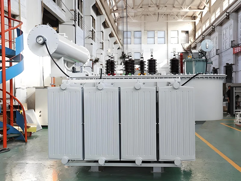 Oil-immersed transformer with bushings